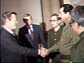 with Saddam Hussein