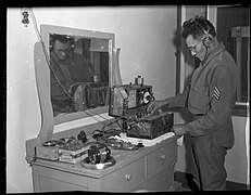 Arizona National Guard sergeant Ernest Mendoza transmitting report by radio, near Parker, Arizona, 1934.jpg