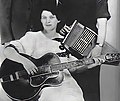 Thumbnail for File:Maybelle Carter with guitar in the 1930s (retouched using Remini App).jpg