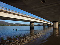 The western Commonwealth Avenue Bridge viewed from the southern shore of Lake Burley Griffin