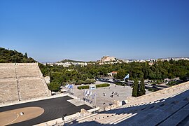 The Acropolis and Philopappos Hill from the Panathenaic Stadium on July 26, 2019.jpg
