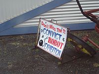 A sign advertising a "Convict Robot Exhibition" at a tourist trap in Tasmania