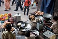 Puris (left) and Samosas (right) being deep fried, at a shop in Varanasi.