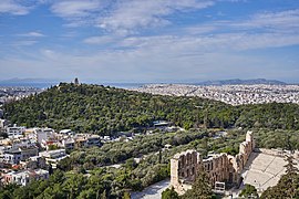 The Odeon of Herodes Atticus and the Philopappos Hill from the Acropolis of Athens on March 5, 2020.jpg