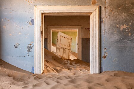 "Abandoned_building,_Kolmannskuppe,_Namibia.jpg" by User:B2Belgium