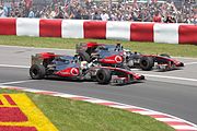 Hamilton (race winner) giving 1-2 finish for McLaren with Jenson Button (runner-up) at the Canadian GP.