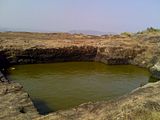 Rock cut cistern at Pavurallakonda