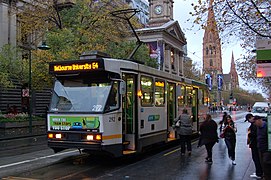 A2 class tram no 292 operating a northbound route 64 service from East Brighton to Melbourne University along Swanston Street