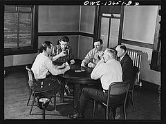 A game of cards at the railroad (YMCA) Young Men's Christian Association - DPLA - 011f3bc88b67a1dabf7d2c99198fe637.jpg