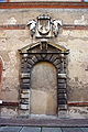 Portale e stemma / Portal and coats of arms.