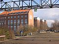 Listed industrial buildings in wilhelminian style in Alt-Treptow. Continuation of the central way from nearby Görlitzer Park on the other side of the Landwehrkanal over the former tracks of Görlitzer Railway.