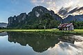 24 Water reflection of karst mountains, wooden hut, trees and colorful clouds at sunset with green paddy fields, Vang Vieng, Laos uploaded by Basile Morin, nominated by Basile Morin,  17,  0,  0