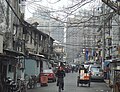 老城区的旧屋和新高楼 Old houses and new high rises in the old city