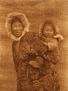 Nunivak mother with child (North America)