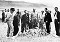 J. Robert Oppenheimer and others at the site of the "Trinity" explosion.