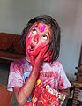 Littile Girl Playing Holi with Gulaal