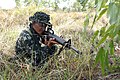 A Philippine marine aiming an M16A1