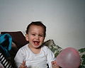 An Egyptian boy playing with a balloon.