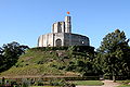 The wooden palisades on top of mottes were often later replaced with stone, as in this example at Château de Gisors in France.