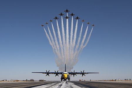 "Thunderbirds,_Blue_Angels_perform_'Super_Delta'_210302-F-JV039-9090.jpg" by User:ToprakM