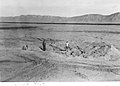 Two men at the "Trinity" crater.