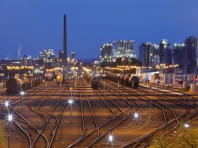 "Godorf_Station_at_Dusk,_May_2018.jpg" by User:Martin Falbisoner