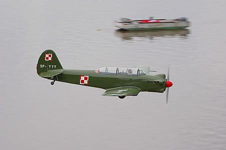 Jak-18 above the Vistula River in Płock