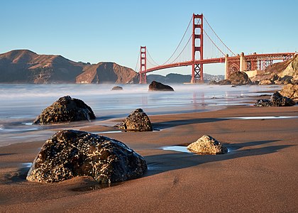 "Golden_Gate_Bridge_as_seen_from_Marshall’s_Beach,_October_2017.jpg" by User:Frank Schulenburg