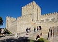 São Jorge Castle in Lisbon, Portugal, with a bridge over a moat.