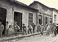 Spanish prisoners in Santiago marching to transports, 1898