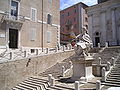 The statue of Clemente XII Pope in Plebiscito square