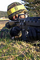 A Republic of Korea (ROK) Soldier aims his 5.56mm M16A1 rifle with 40mm M203 grenade launcher attached