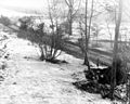 The members of the 101st Airborne Division, right, are on guard for enemy tanks, on the road leading to Bastogne, They are armed with bazookas. (12/23/1944)