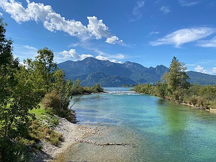 coming out of the lake Kochelsee, mountain Herzogstand above