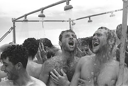 "Flickr_-_Government_Press_Office_(GPO)_-_Soldiers_Shower_Near_Eilat.jpg" by User:Andrew J.Kurbiko