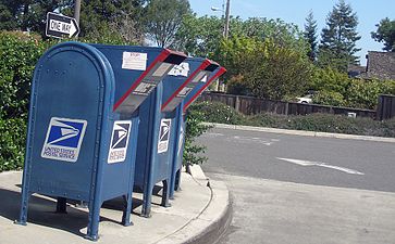 United States, operator: United States Postal Service. A drive-through lane at a post office