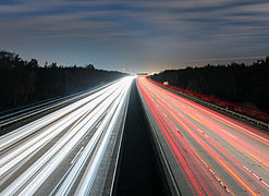 A5 with Frankfurt airport on the horizon - Autobahn A5 mit Flughafen Frankfurt am Horizont - 02