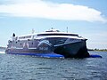 The cat ferry docking in Yarmouth Harbour