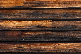 Stained wooden clapboard siding