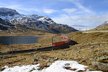 Regional train on the Bernina Line at Lago Bianco