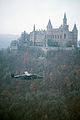 A 10th Military Airlift Squadron C-23A Sherpa. In the background is a castle.