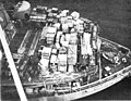 Glacier's flight deck and fantail showing tpyical loads shuttled from cargo vessels to Hut Point.