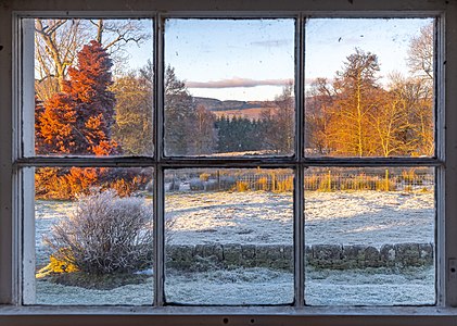 View of a frosty evening through a window on a Scottish farm