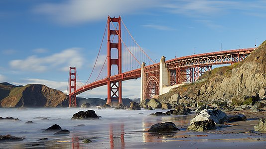 "Golden_Gate_Bridge_as_seen_from_Marshall’s_Beach,_March_2018.jpg" by User:Frank Schulenburg