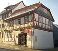 Deutsch: Das "Ochsenbäckerhaus" in Tann (Rhön), vom 1592 English: The "Ochsenbäckerhaus" (ox baker house), from 1592 in Tann (Rhön)