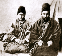 Varqa (r) and his son Ruhu'llah (l), before their 1896 execution for being Bábís.png