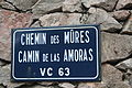 Plaque de rue bilingue : Camin de las Amoras.