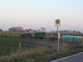 Bus stop and tractor