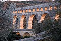 Setting sun illuminating inside of arches, 10mar2012-18.24h (by Rik Schuiling).