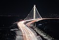 "Eastern_span_of_the_San_Francisco_Oakland_Bay_Bridge_at_night_dllu.jpg" by User:Dllu